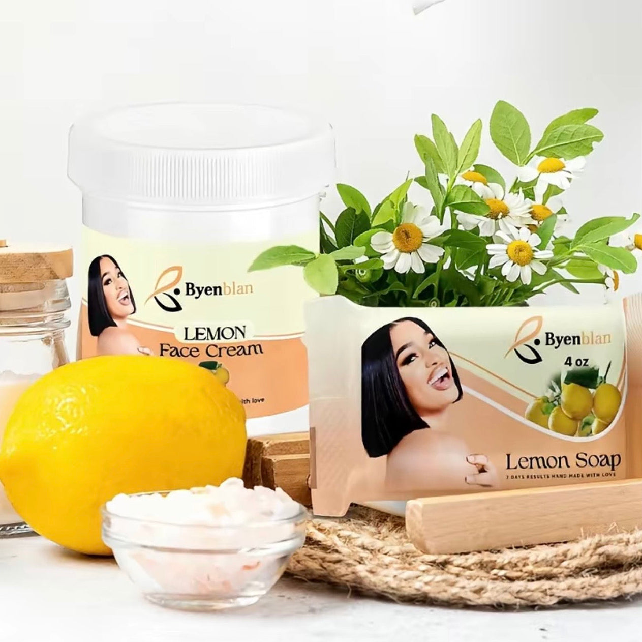 Byenblan lemon face cream, soap, and soap bar with a lemon on a white background